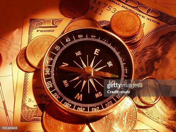 compass and money - shulz bildbanksfoton och bilder