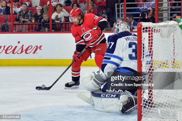 Carolina Hurricanes Right Wing Justin Williams waits for a pass in front of Winnipeg Jets Goalie Connor Hellebuyck during a game between the Winnipeg...