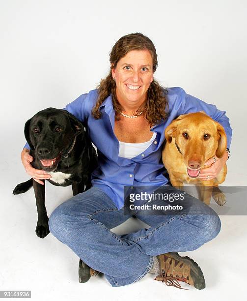 woman with dogs - renphoto stock pictures, royalty-free photos & images