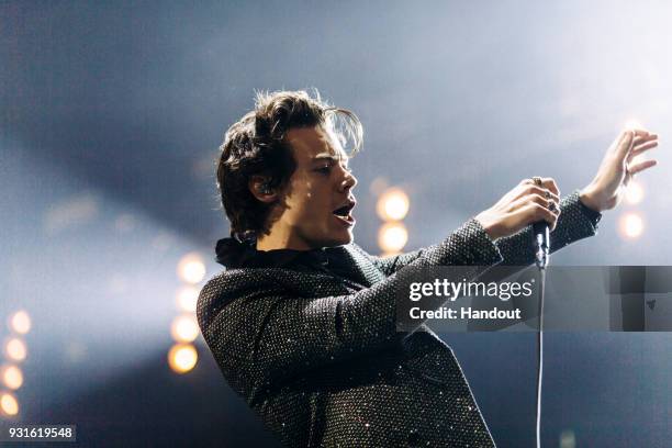 In this handout photo provided by Helene Marie Pambrun, Harry Styles performs during his European tour at AccorHotels Arena on March 13, 2018 in...