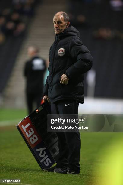 Fourth Official Graham Horwood stands with the substitute board during the Sky Bet League One match between Milton Keynes Dons and Rotherham United...