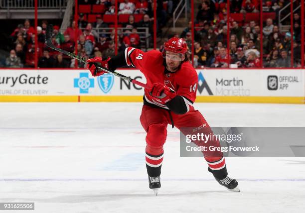 Justin Williams of the Carolina Hurricanes skates for position during an NHL game against the Boston Bruins on March 13, 2018 at PNC Arena in...