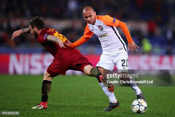 Alan Patrick of Shakhtar Donetsk and Daniele De Rossi of AS Roma in action during the UEFA Champions League Round of 16 Second Leg match between AS...