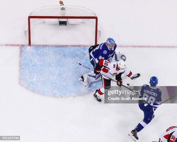 Goalie Andrei Vasilevskiy of the Tampa Bay Lightning gives up a goal after Tom Pyatt of the Ottawa Senators deflects the puck during the first period...