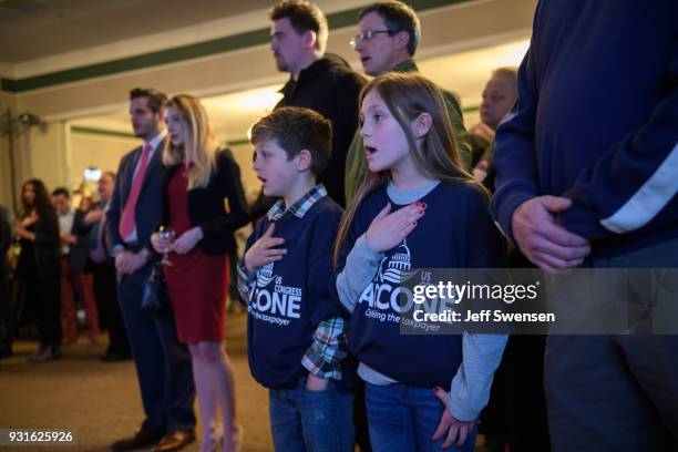 Tyten Springer and his sister, Lowen sing the National Anthem at an Election Night event for GOP PA Congressional Candidate Rick Saccone as the polls...