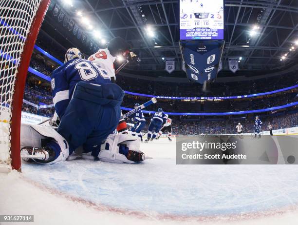 Goalie Andrei Vasilevskiy of the Tampa Bay Lightning gives up a goal against Tom Pyatt and the Ottawa Senators during the first period at Amalie...