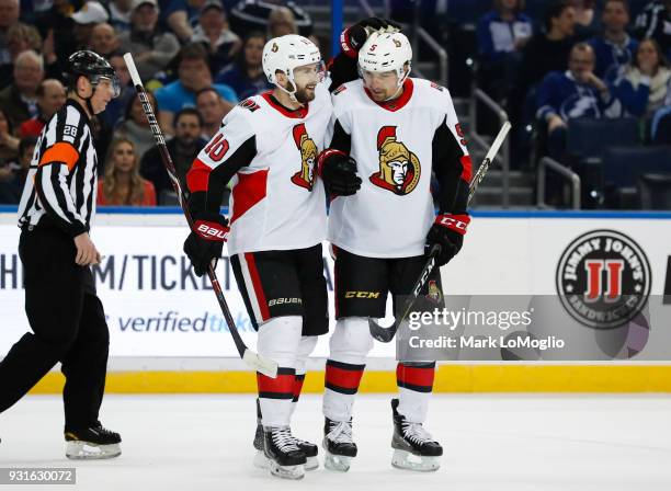 Tom Pyatt and Cody Ceci of the Ottawa Senators celebrate a goal against the Tampa Bay Lightning during the first period at Amalie Arena on March 13,...