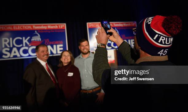 Guests have their photo taken at an Election Night event for GOP PA Congressional Candidate Rick Saccone as the polls close on March 13, 2018 at the...