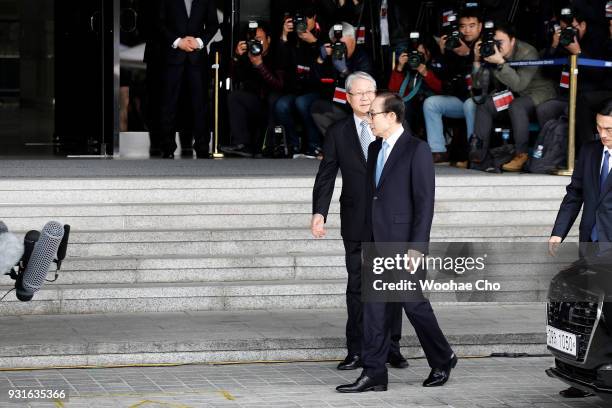 South Korea's former President Lee Myung-Bak arrives at a prosecutor's office on March 14, 2018 in Seoul, South Korea. Seoul Central District...