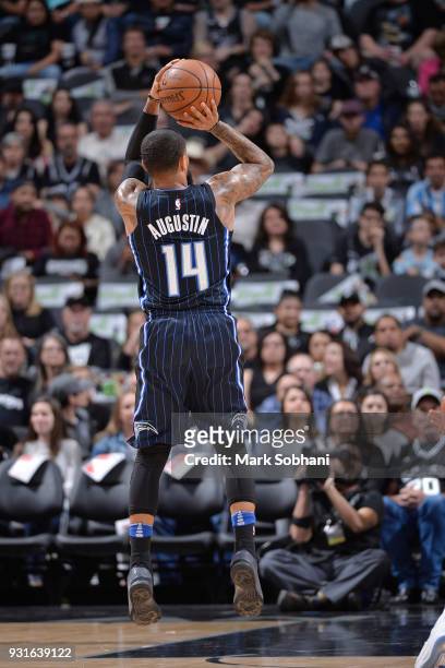 Augustin of the Orlando Magic shoots the ball during the game against the San Antonio Spurs on March 13, 2018 at the AT&T Center in San Antonio,...