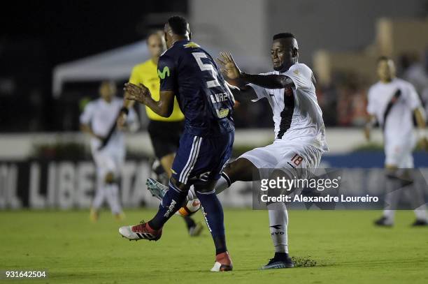 Duvier Riascos of Vasco da Gama struggles for the ball with Rafael Vaz of Universidad de Chile during a Group Stage match between Vasco and...