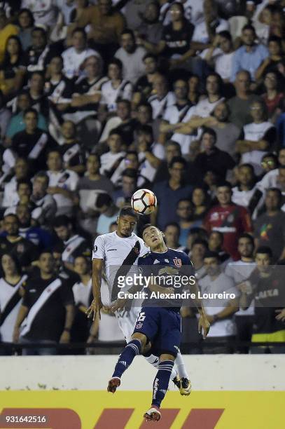 Henrique of Vasco da Gama struggles for the ball with MatÃ­as Rodriguez of Universidad de Chile during a Group Stage match between Vasco and...
