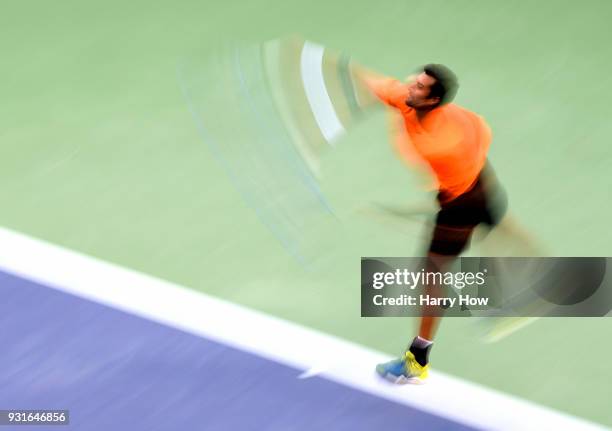 Yuki Bhambri of India serves in his match against Sam Querrey of the United States during the BNP Paribas Open at the Indian Wells Tennis Garden on...