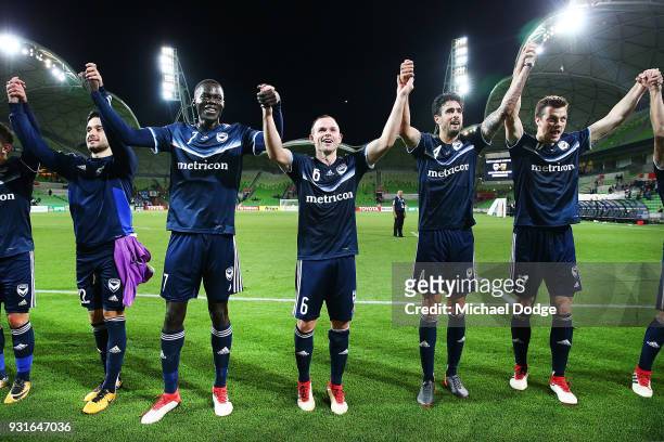 Kenny Athiu Leigh Broxham and Rhys Williams of the Victory celebrates the win during the AFC Asian Champions League match between the Melbourne...