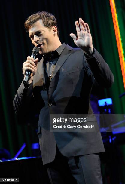 Singer Harry Connick, Jr. Performs live on stage to help celebrate the 2009 holiday windows unveiling at Bloomingdale's on November 17, 2009 in New...