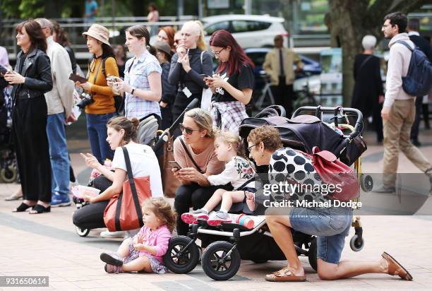 Interested people look on during an excerpt of Graeme Murphy's Firebird at Melbourne Arts Centre on March 14, 2018 in Melbourne, Australia.