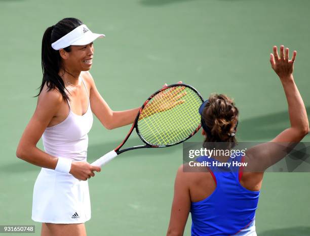 Su-Wei Hsieh of Chinese Taipei celebrates with Barbora Strycova of the Czech Republic after a win over Vania King of the United States and Katarina...