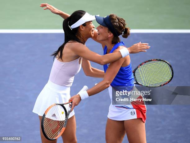 Su-Wei Hsieh of Chinese Taipei celebrates with Barbora Strycova of the Czech Republic after a win over Vania King of the United States and Katarina...