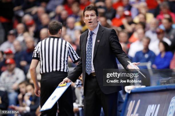 Head coach Steve Alford of the UCLA Bruins reacts to his team against the St. Bonaventure Bonnies during the first half of the First Four game in the...