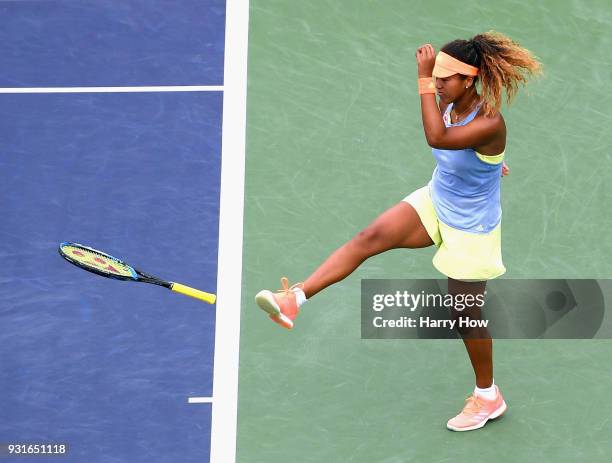 Naomi Osaka of Japan reacts after a lost point in her match against Maria Sakkari of Greece during the BNP Paribas Open at the Indian Wells Tennis...