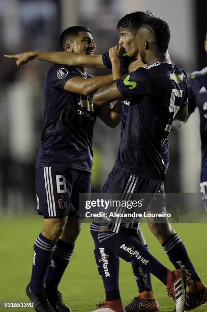 Angelo Araos of Universidad de Chile celebrates their first scored goal during a Group Stage match between Vasco and Universidad de Chile as part of...