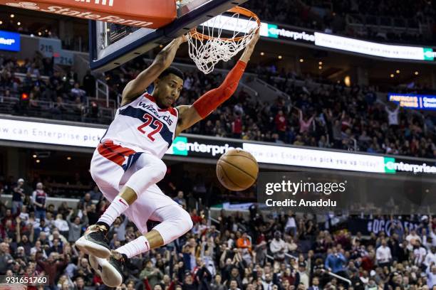 March 13: Washington Wizards Otto Porter Jr. Dunks the ball against the Minnesota Timberwolves at the Capital One Arena in Washington, USA on March...