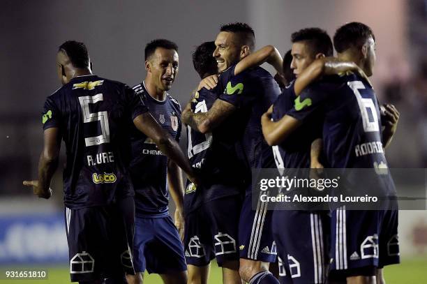 Players of Universidad de Chile celebrates their first scored goal by Angelo Araos during a Group Stage match between Vasco and Universidad de Chile...