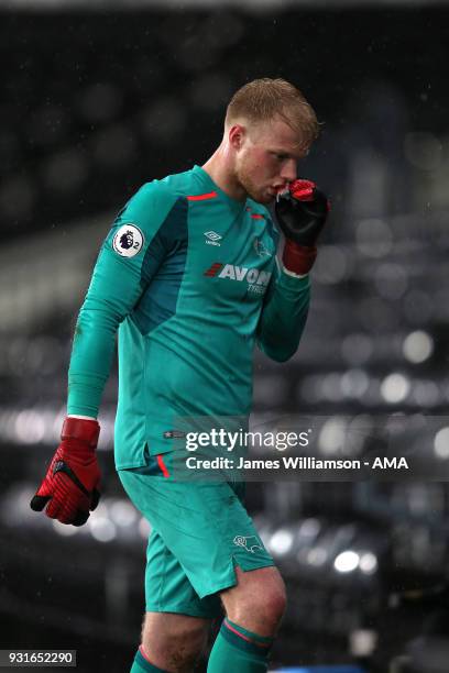 Jonathan Mitchell of Derby County comes off with a facial injury during the Premier League 2 match between Derby County and Manchester City on March...