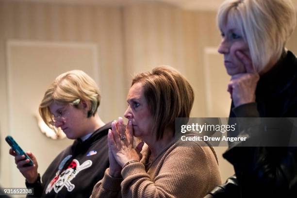 Supporters monitor election returns at an election night event for Conor Lamb, Democratic congressional candidate for Pennsylvania's 18th district,...