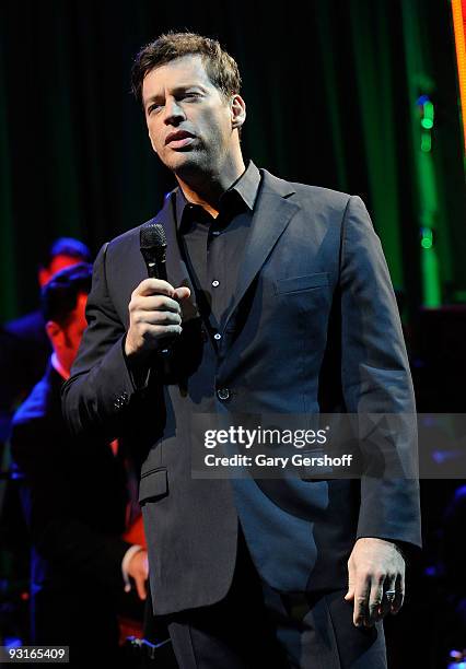 Singer Harry Connick, Jr. Performs live on stage to help celebrate the 2009 holiday windows unveiling at Bloomingdale's on November 17, 2009 in New...