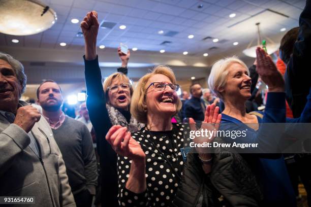 Supporters cheer as they watch election returns at an election night event for Conor Lamb, Democratic congressional candidate for Pennsylvania's 18th...