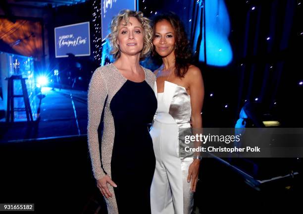 Hosts Teri Polo and Sherri Saum pose backstage during A Legacy Of Changing Lives presented by the Fulfillment Fund at The Ray Dolby Ballroom at...