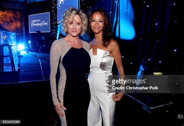 Hosts Teri Polo and Sherri Saum pose backstage during A Legacy Of Changing Lives presented by the Fulfillment Fund at The Ray Dolby Ballroom at...