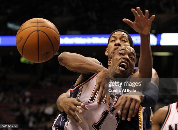 Rafer Alston of the New Jersey Nets battles with Danny Granger of The Indiana Pacers during their game on November 17, 2009 at The Izod Center in...