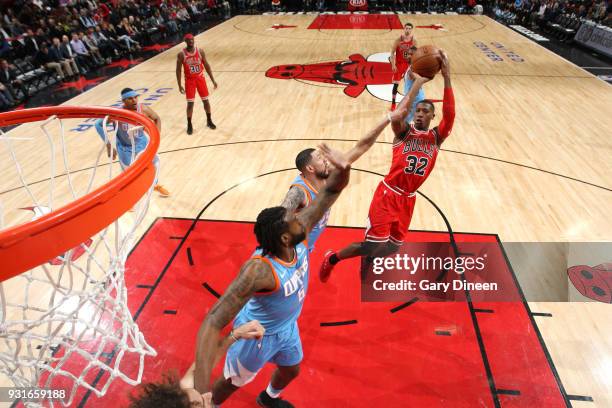 Kris Dunn of the Chicago Bulls goes to the basket against the LA Clippers on March 13, 2018 at the United Center in Chicago, Illinois. NOTE TO USER:...