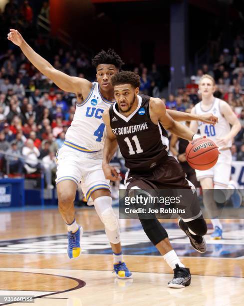 Courtney Stockard of the St. Bonaventure Bonnies is defended by Jaylen Hands of the UCLA Bruins during the second half of the First Four game in the...
