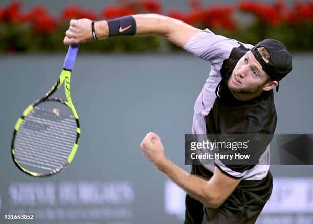Jack Sock of the United States serves in his match against Feliciano Lopez of Spain during the BNP Paribas Open at the Indian Wells Tennis Garden on...