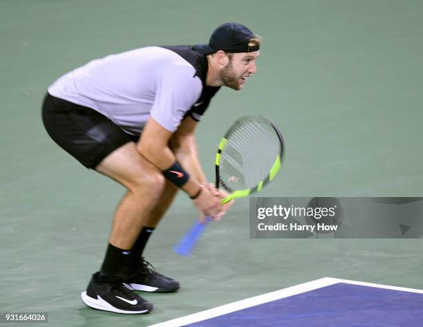 Jack Sock of the United States reacts to a lost point in his match against Feliciano Lopez of Spain during the BNP Paribas Open at the Indian Wells...