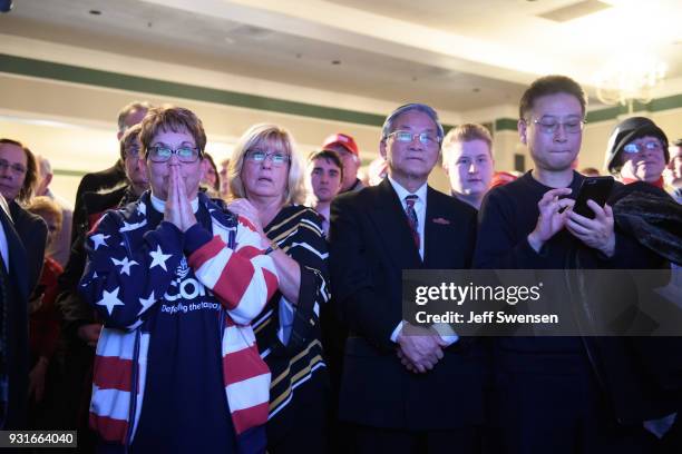 Anticipation builds among as they watch early election results at an Election Night event for GOP PA Congressional Candidate Rick Saccone as the...