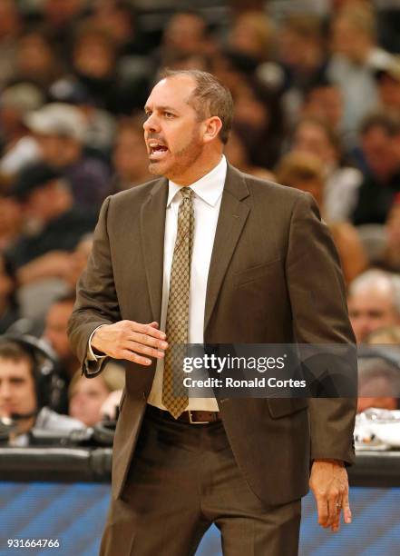 Frank Vogel head coach of the Orlando Magic yells out instruction during game against the San Antonio Spurs at AT&T Center on March 13, 2018 in San...