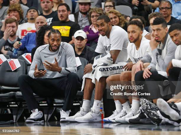 Kawhi Leonard of the San Antonio Spurs still not playing talks with teammate LaMarcus Aldridge of the San Antonio Spurs during game against the...