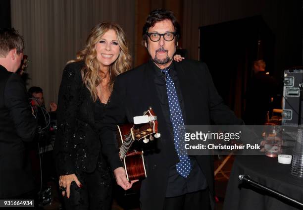 Rita Wilson and Stephen Bishop pose backstage during A Legacy Of Changing Lives presented by the Fulfillment Fund at The Ray Dolby Ballroom at...
