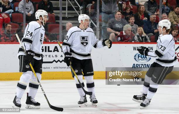 Tanner Pearson of the Los Angeles Kings is congratulated by teammates Derek Forbort and Tyler Toffoli after his second period goal against the...