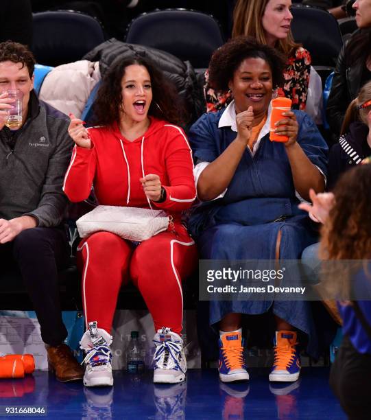 Dasha Polanco and Adrienne C. Moore attend the New York Knicks Vs Dallas Mavericks game at Madison Square Garden on March 13, 2018 in New York City.