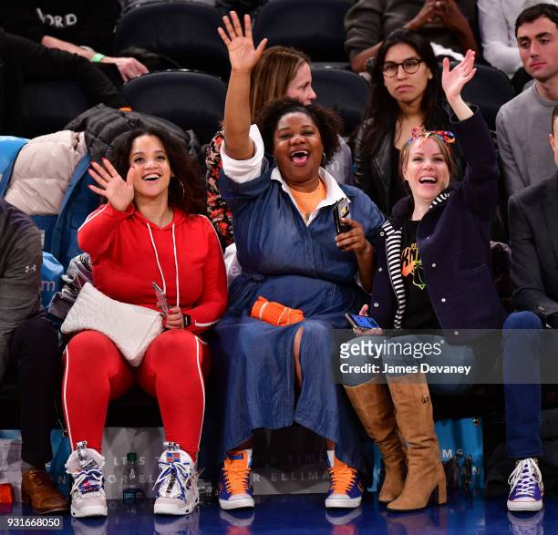 Dasha Polanco, Adrienne C. Moore and Emma Myles attend the New York Knicks Vs Dallas Mavericks game at Madison Square Garden on March 13, 2018 in New...