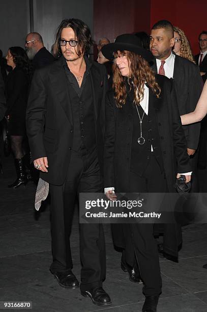 Actor Johnny Depp and musician Patti Smith attend a Tribute to Tim Burton at The Museum of Modern Art on November 17, 2009 in New York City.