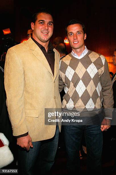 New York Giants football players Zak DeOssie and Lawrence Tynes attend the opening of "The 2009 Radio City Christmas Spectacular" at Radio City Music...