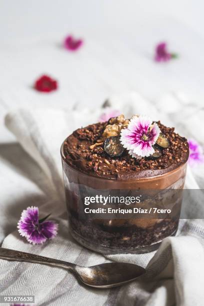 chocolate layered dessert pot with vintage spoon on side - chocolate cake texture stock pictures, royalty-free photos & images