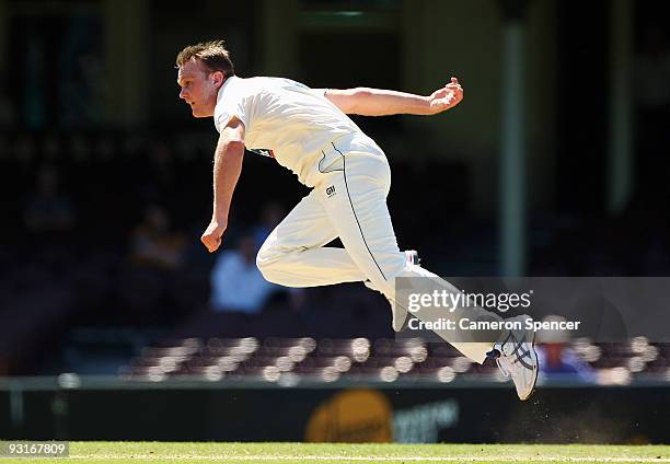 Doug Bollinger of the Blues bowls during day two of the Sheffield Shield match between the New South Wales Blues and the Tasmanian Tigers at Sydney...