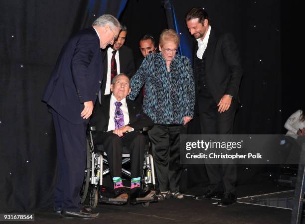 Honorees Cherna Gitnick and Dr. Gary Gitnick with Robert De Niro and Bradley Cooper onstage during A Legacy Of Changing Lives presented by the...